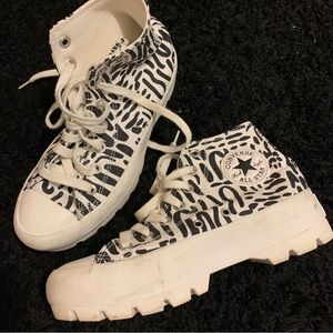 Converse high top chunky platform shoes.